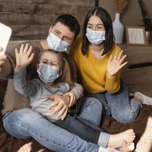 full-shot-family-wearing-masks